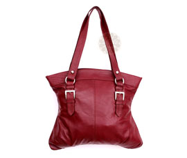 Vogue Crafts and Designs Pvt. Ltd. manufactures Ladies Maroon Handbag at wholesale price.